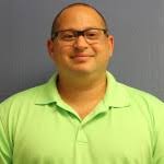 A snapshot of  Harvey with a lime green shirt